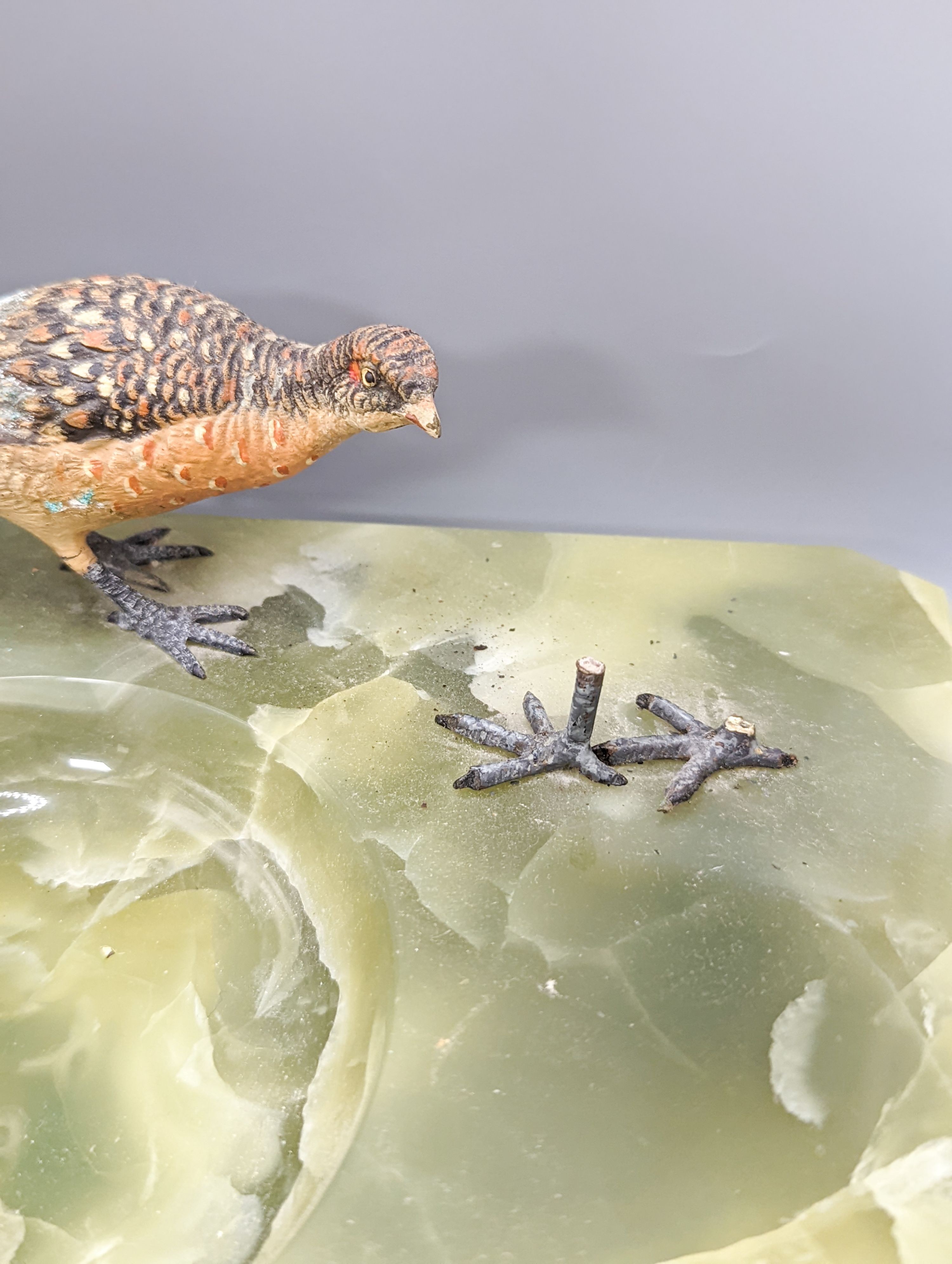 A green onyx ash stand, mounted with cold painted bronze pheasants and another, mounted with a model of an owl (2)